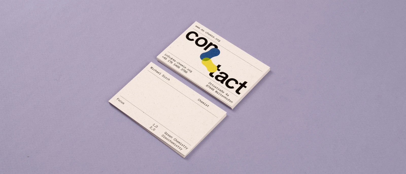 MS Chemie business cards on a pale violet background.